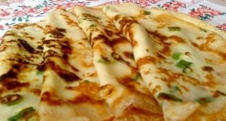 Pancakes with green onions and cheese
